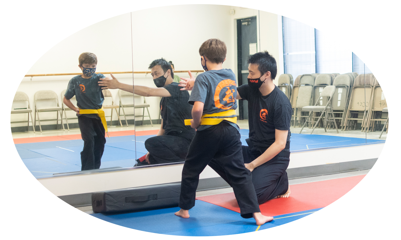 Kids practicing martial arts in class
